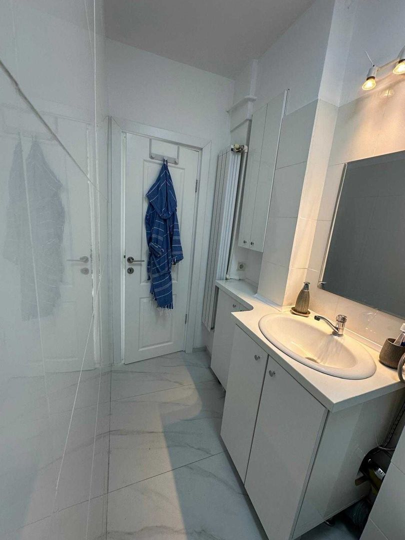 Apartament 2 camere de vânzare - Piața Romană - mobilat nou, vedere pe spate - Poză 8