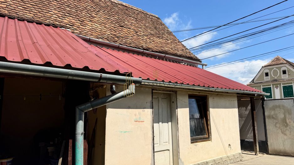 Casă la țară cu teren generos în satul Ruși - Poză 2