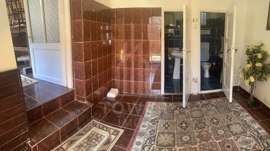 Casă în centrul Cisnădioarei cu 243mp de locuit și teren de 936mp - Poză 27