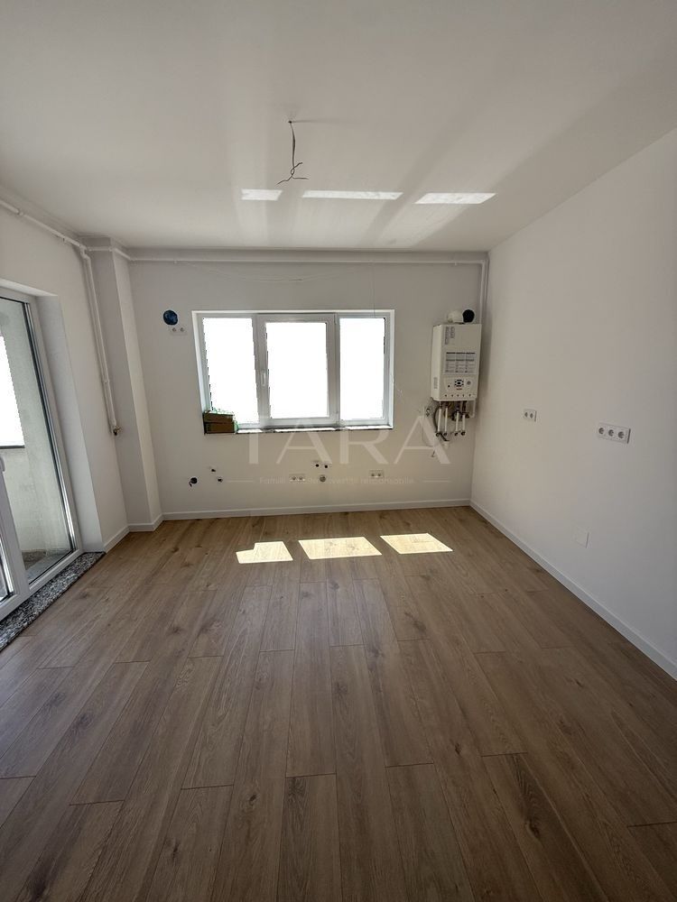 Apartament cu 2 camere, finisat modern, central Floresti. - Poză 2