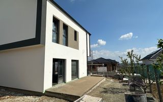 Casă single modernă, eficientă energetic și curte generoasă - Poză 3