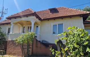 Casa in mediu rural cu teren