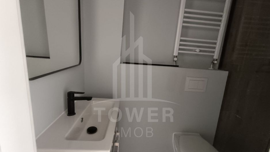 Garsonieră la mansardă, bloc nou - Poză 3