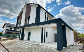 Casă single modernă, eficientă energetic și curte generoasă - Poză 2