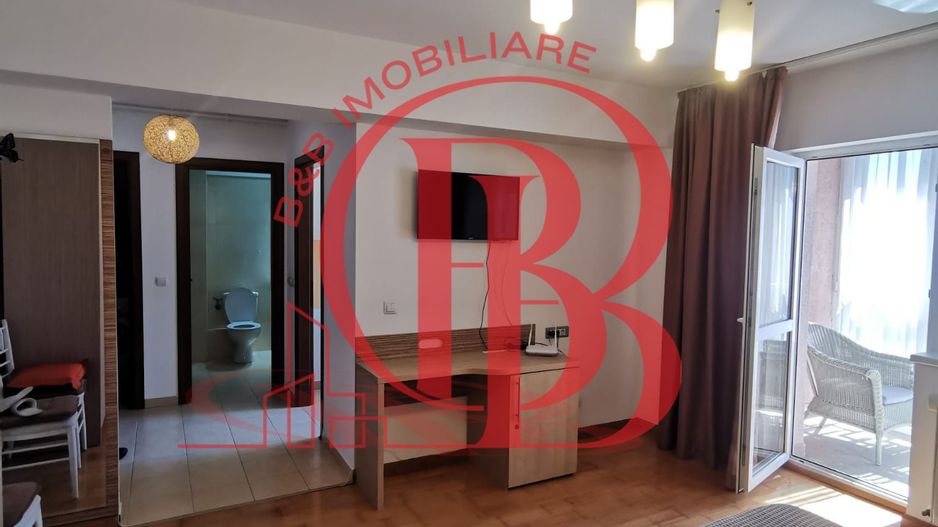 Garsoniera spatioasa mobilata si utilata ideala pt investitie - Poză 8