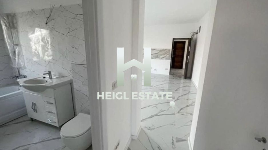 Apartament cu 2 camere si gradina in zona Braytim - Poză 4