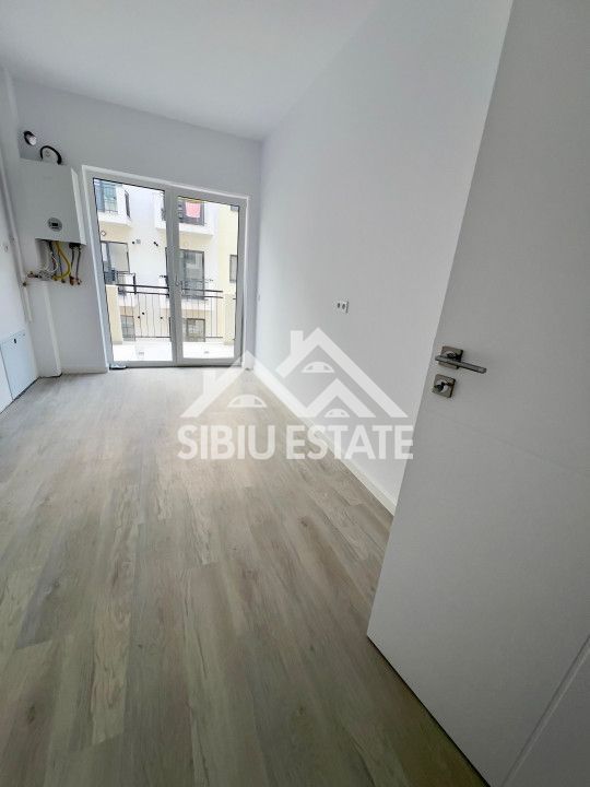 Studio 41 mp, balcon bucatarie separata , intabulata zona Brana - Poză 2