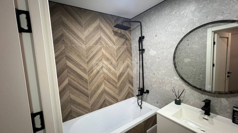 Apartament  cu 1 Cameră + Living pe Bd. Dacia, Botanica - Poză 6