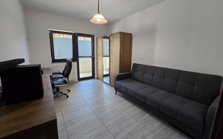 Apartament cu 3 camere si gradina, zona centrala a localitatii - Poză 3