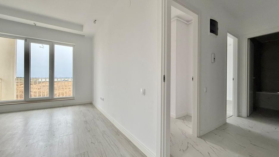 COSMOPOLIS - Apartament cu 2 camere - Poză 1