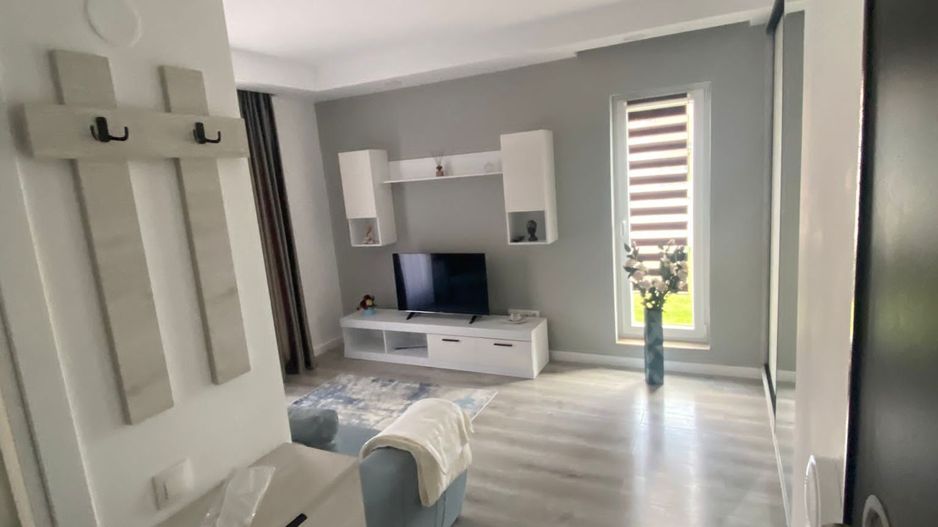 COSMOPOLIS - Apartament Tip studio cu 123 mp gradina,complet mobilat - Poză 2