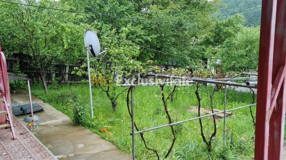 Casă P+M cu 1.558 mp teren, livadă și garaj - Poză 20