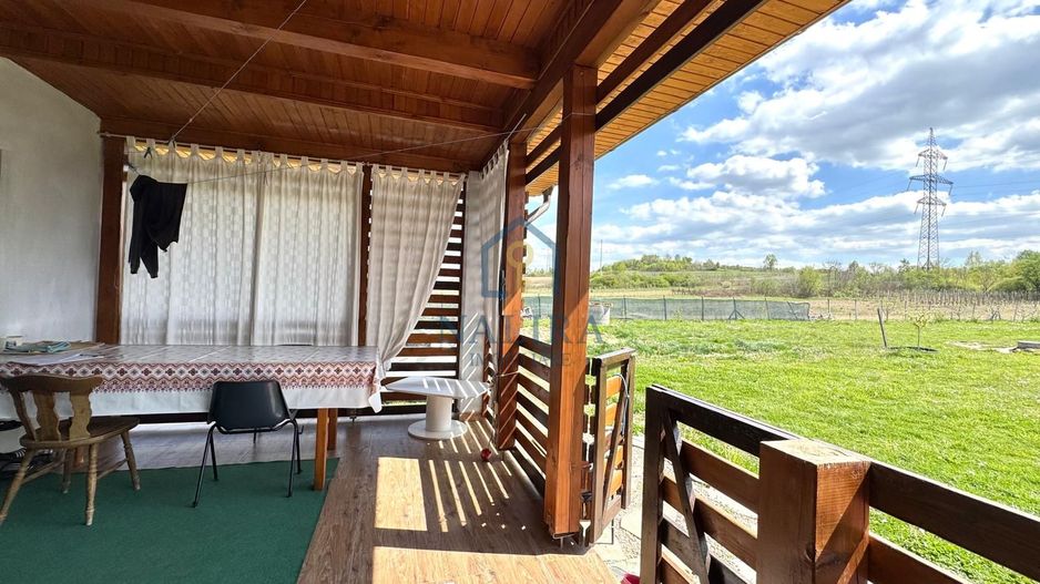 Casa de vanzare cu 14 Ari teren - Lapusel - Poză 4