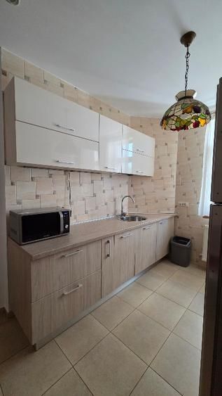 Apartament  in vila Pangratti // Televiziune - Poză 10