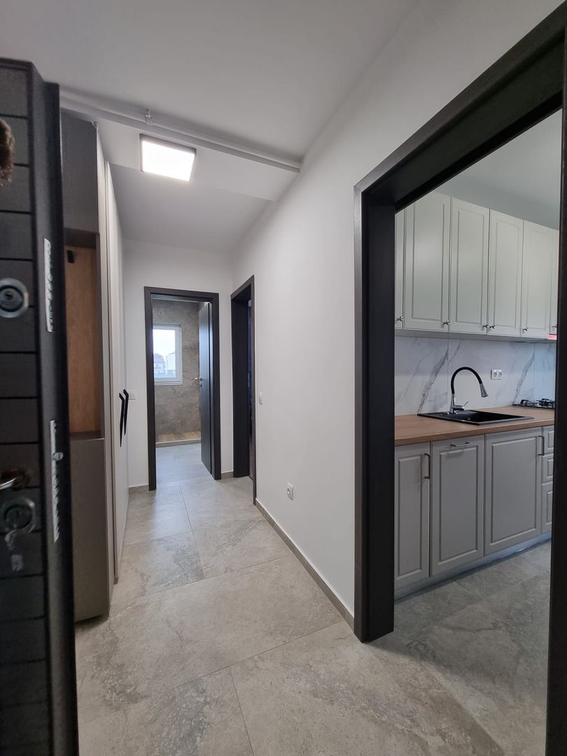 De vanzare apartament 2 camere cu gradina - Poză 8