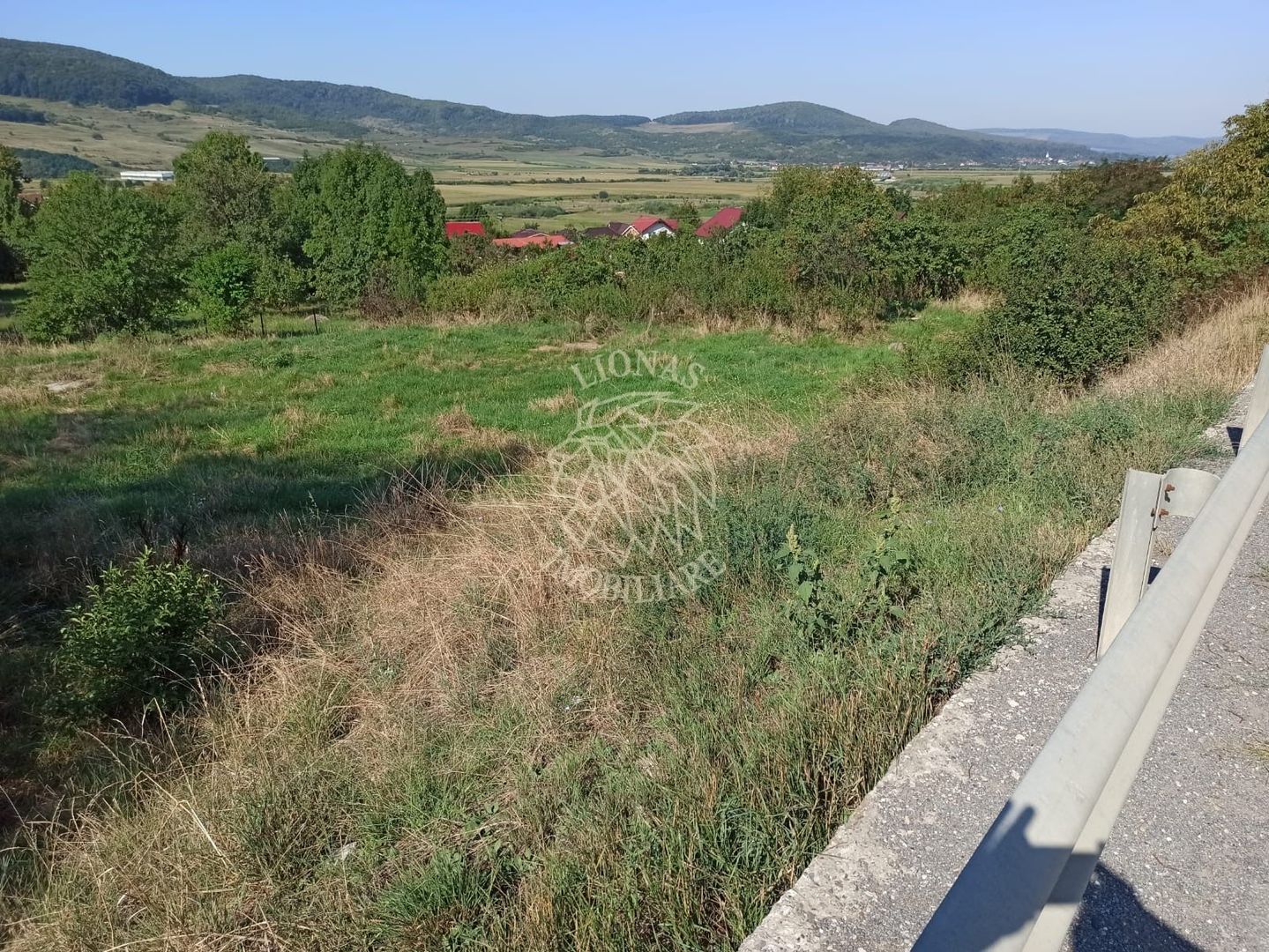 Teren intravilan 1400 mp cu utilitati la DN 17- Crainimat - Poză 1