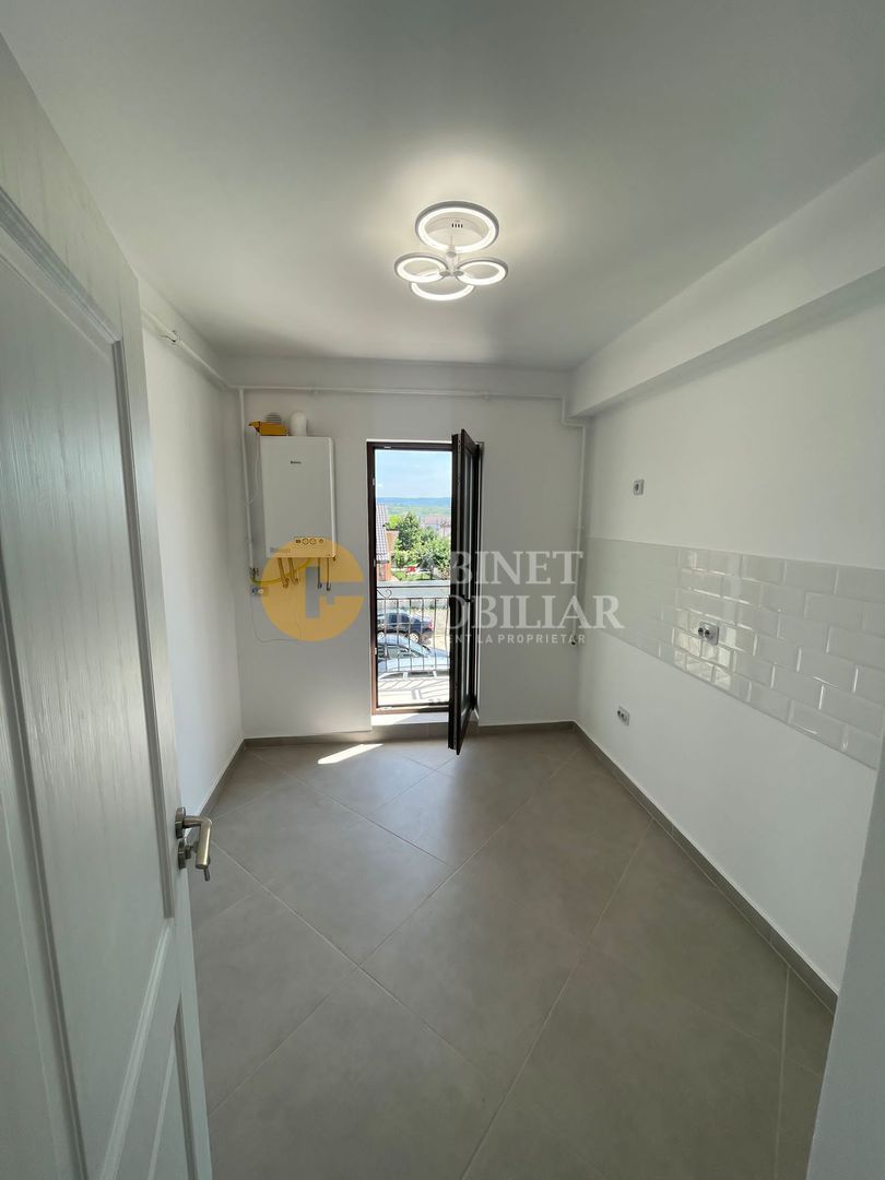 Etajul 1  Cug 2 Camere Decomandat 50 mp - Poză 4