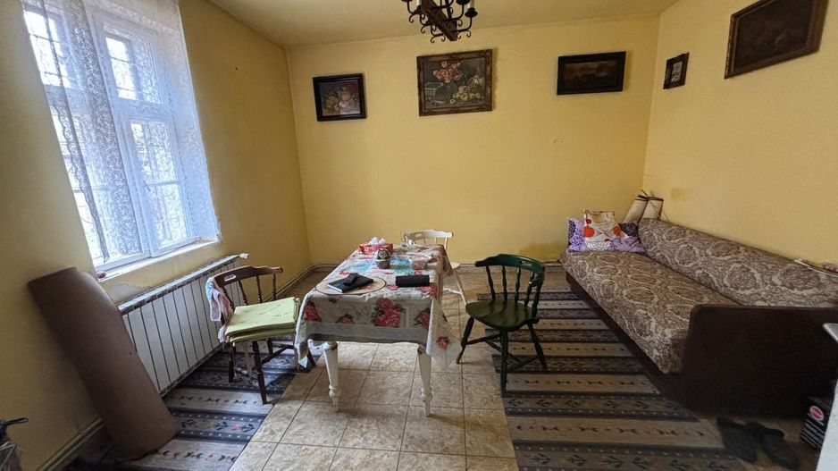 Casa pe parter cu acces auto - Poză 1