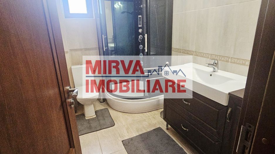 Vilă spațioasă Strejnicu S+P+1E+M, 8 camere, garaj, teren 595 mp - Poză 40