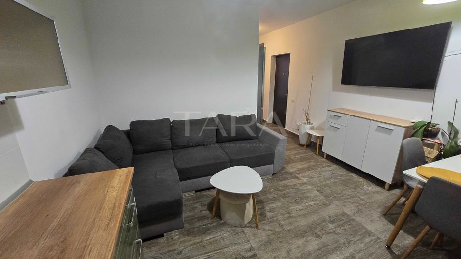 Apartament cu 3 camere si gradina, zona centrala a localitatii - Poză 1
