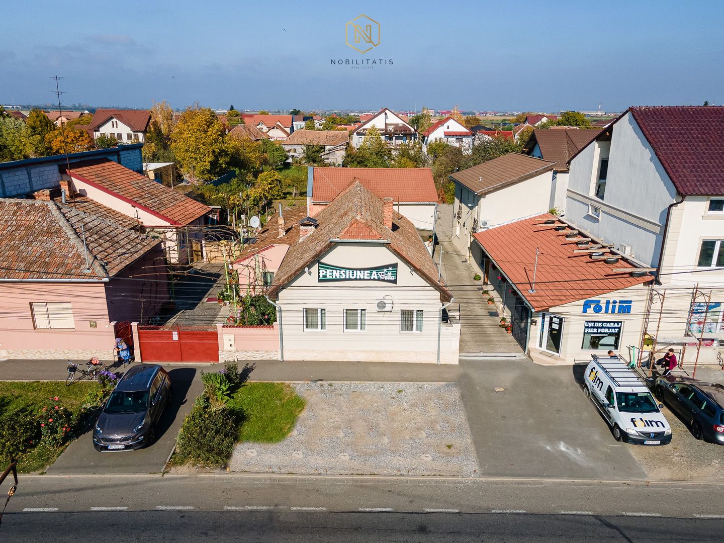 Proprietatea ideala pentru investiție, spații generoase, teren 1.200mp - Poză 1