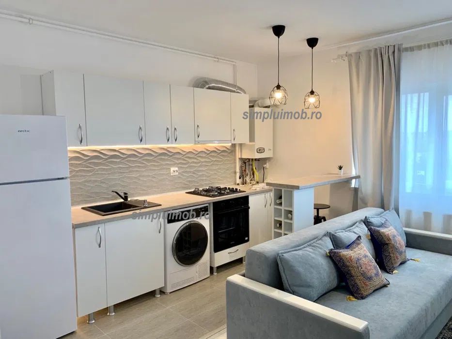 Centrala proprie bloc nou studio renovat mobilat Ozana - Poză 2