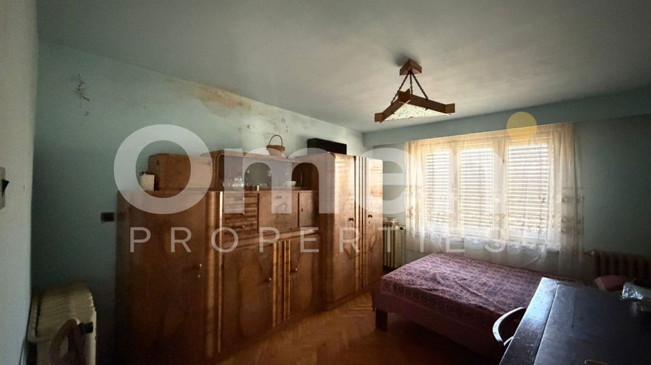 Casa de vanzare cu 446 mp teren si garaj, situata in zona centrala - Poză 4