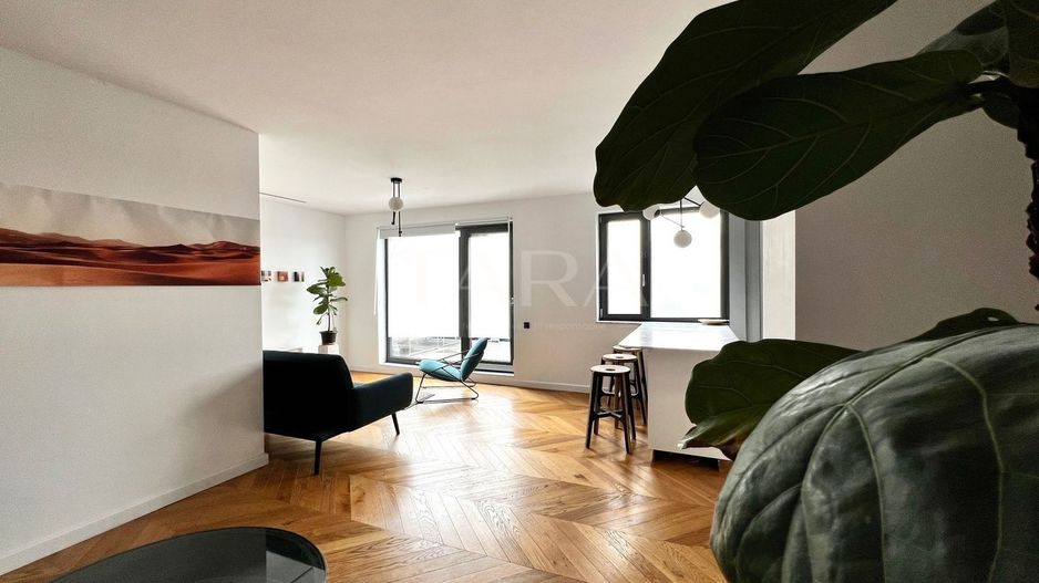 Apartament modern cu terasă spațioasă de vânzare în Mărăști. - Poză 1