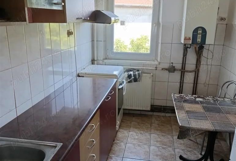 Apartament 2 camere B-ul Dambovita cu centrala - Poză 1