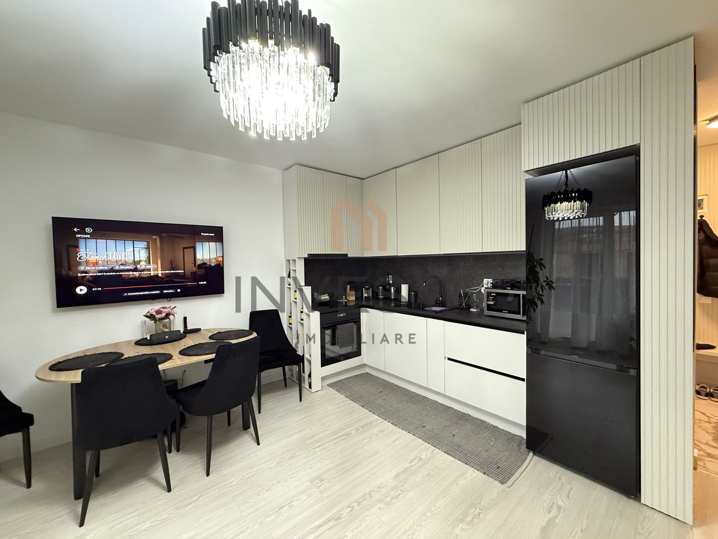 Locuință elegantă cu terasă generoasă și parcare subterană - Poză 1