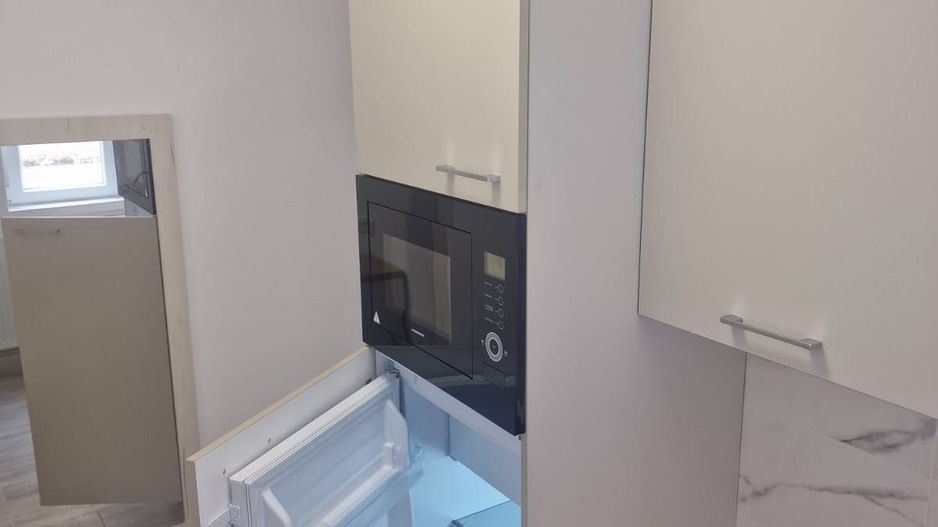 Apartament central cu o camera si loc de parcare - Poză 7