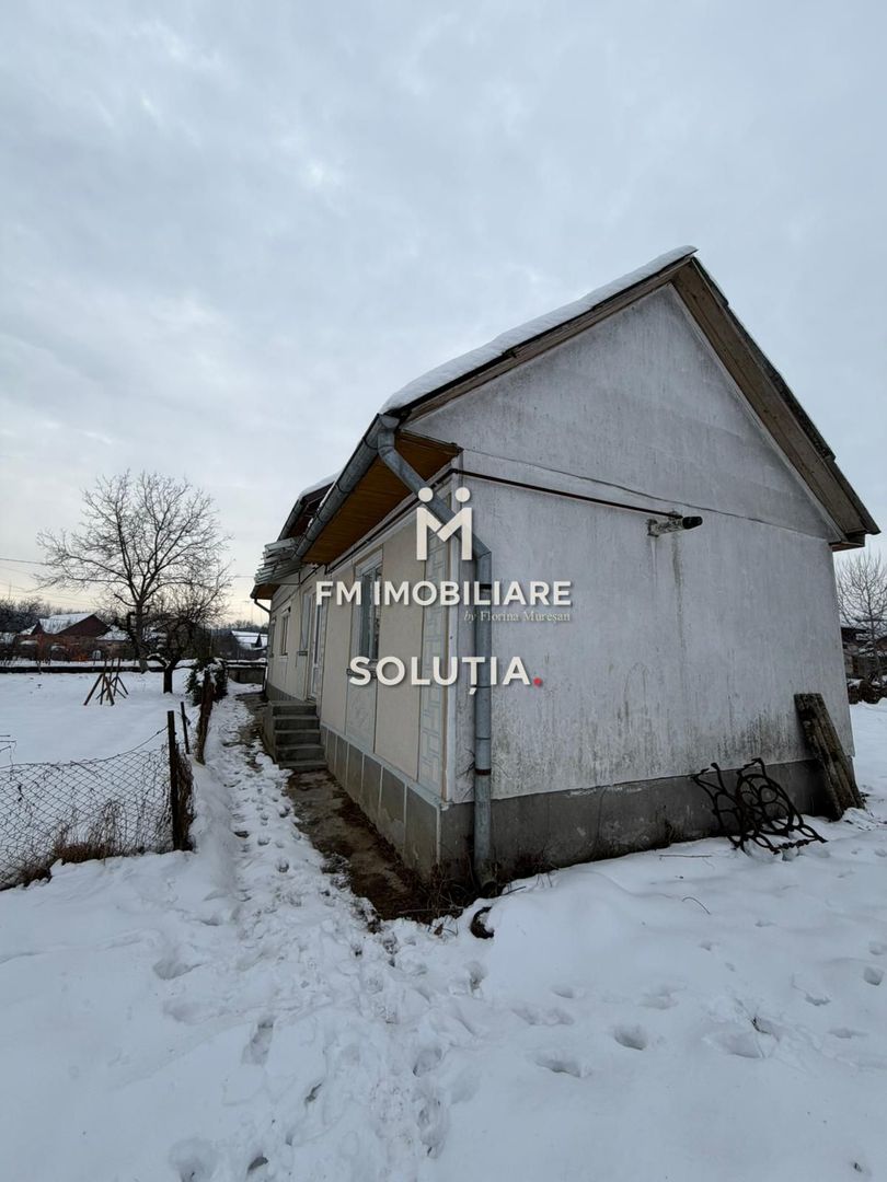 Casă cu teren generos în Buciumi - Poză 3