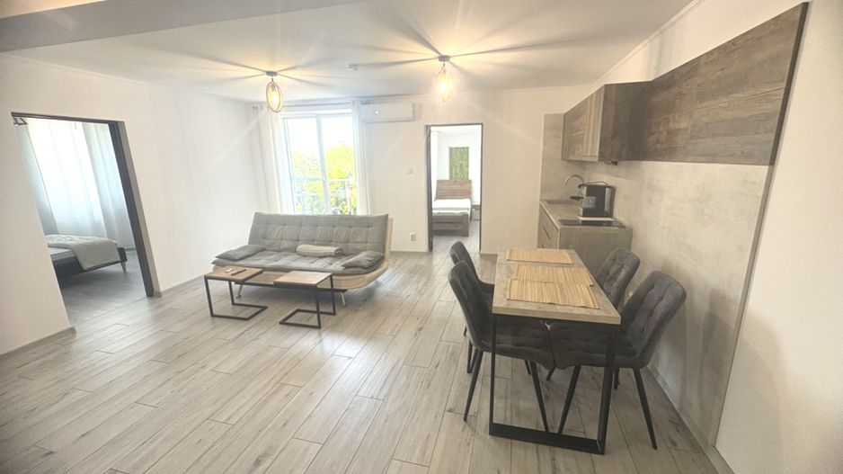 Apartament la casă, cu 4 camere - Poză 2