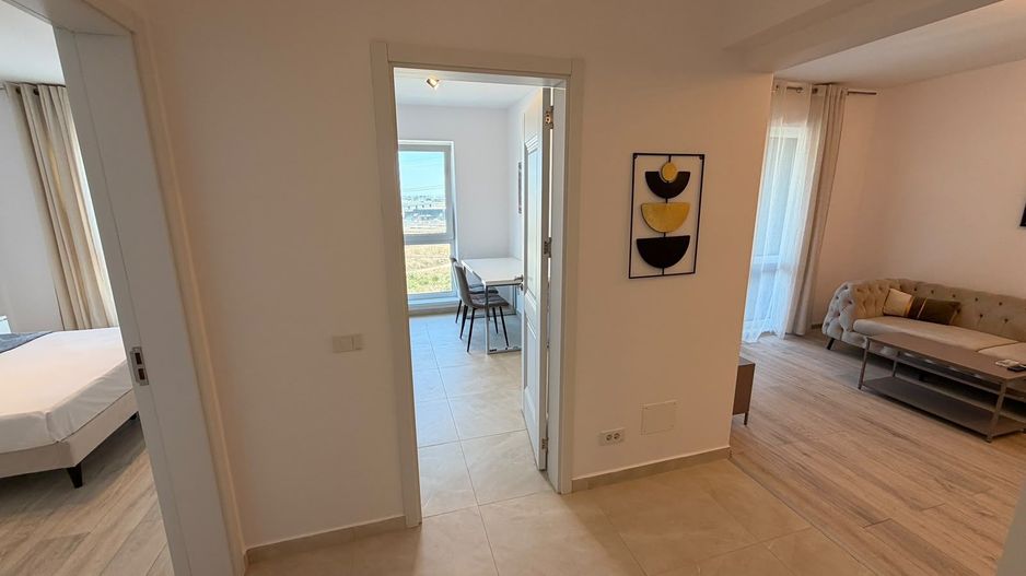AP. 2 CAMERE- PARCARE INCLUSA, CENTRALA, BUCATARIE INCHISA, MODERN - Poză 4