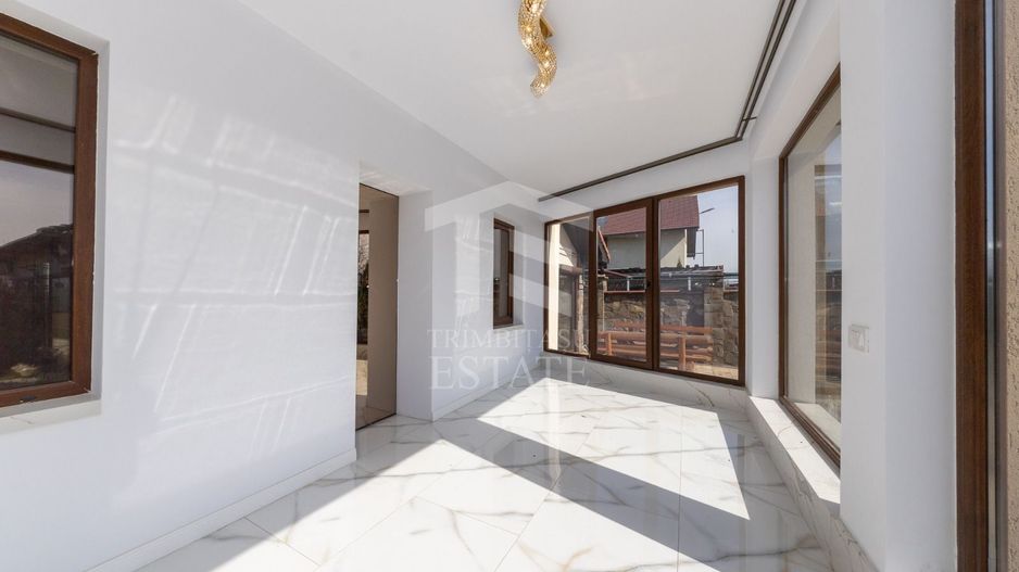Sacele-Casa 6 dormitoare + 4 bai teren 979 mp. - Poză 38