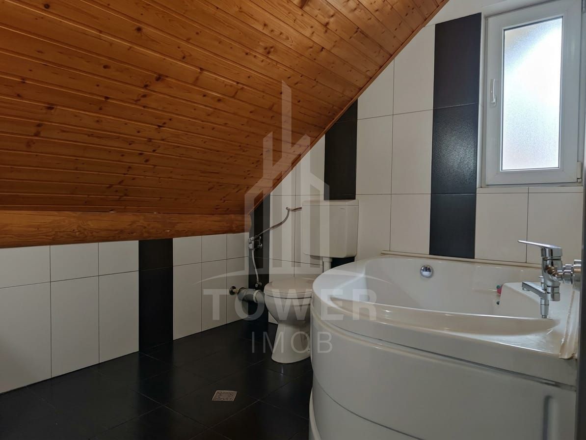 Casă individuală cu 2 apartamente și anexă generos de 100 mp - Poză 16