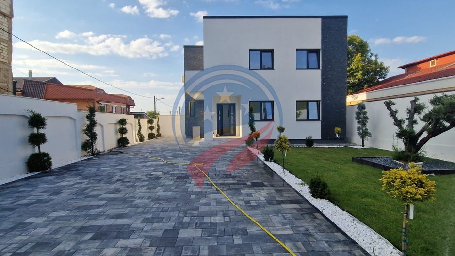 Casă modernă de lux – 4 camere, teren 373 mp, curte amenajată - Poză 1