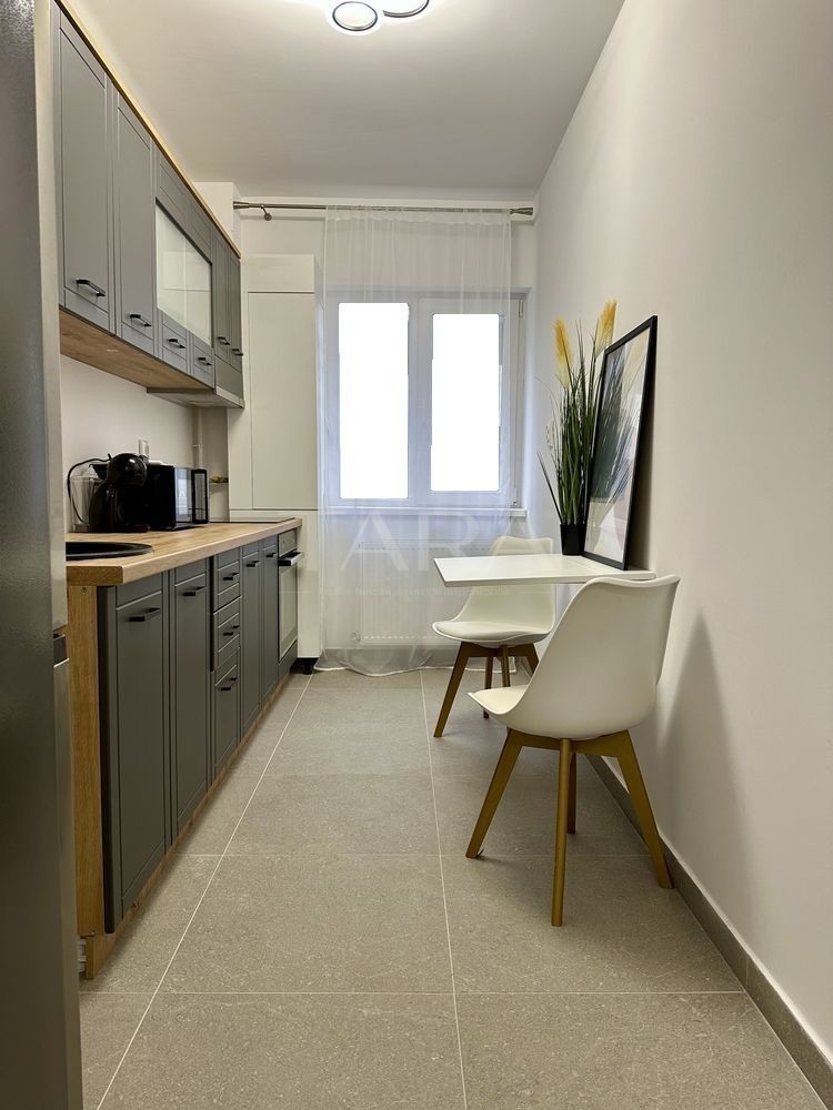 Apartament luminos. Finisat modern. Zonă liniștită. - Poză 4