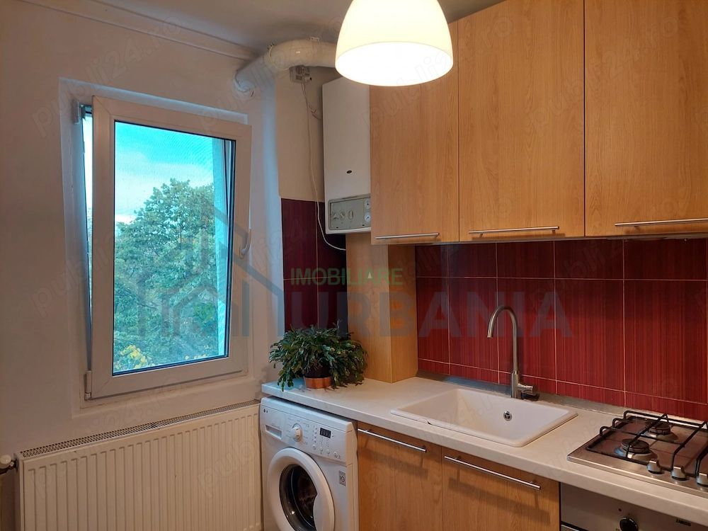 Ofer spre inchiriere un apartament cu 2 Camere. - Poză 7