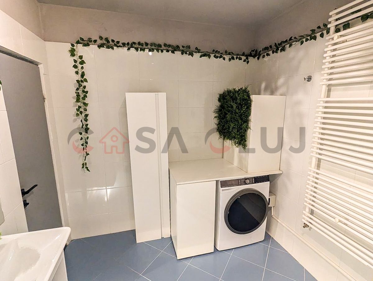 La cheie, cu doua locuri de parcare, ferit de agitatie si aglomeratie - Poză 11