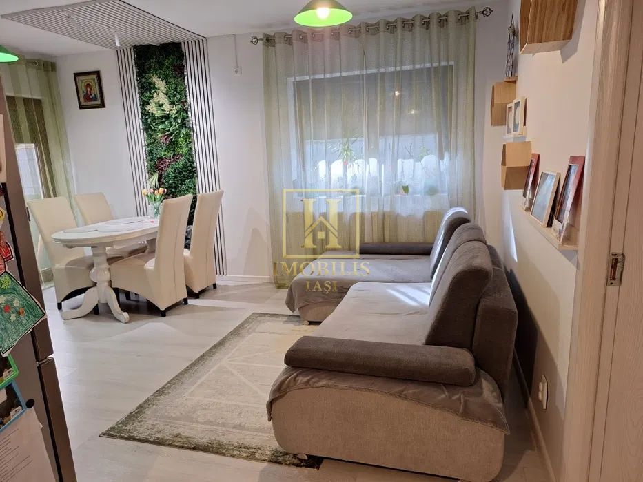 Apartament 3 camere Dec 60 mp mobilat cu gradina Bucium 100000 euro - Poză 1
