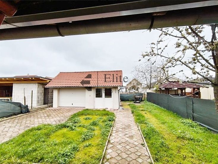 Casa cu 4 camere garaj si curte de 500 mp in Nojorid - Poză 4