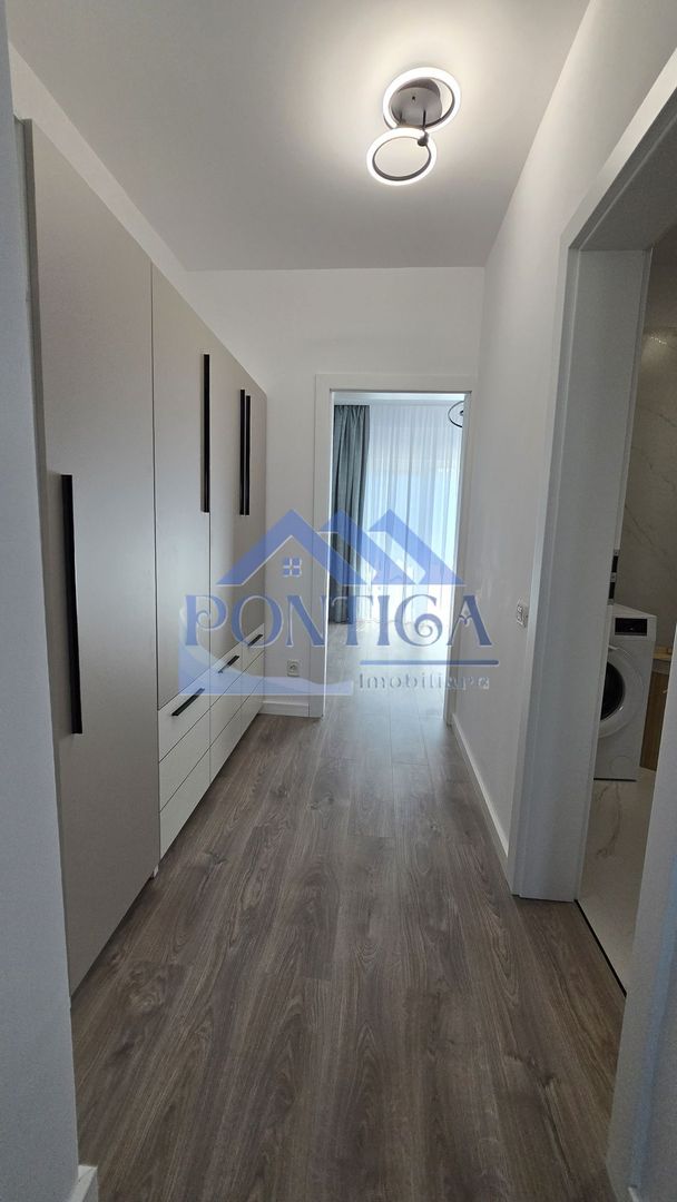 Inchiriez apartament 2 camere, zona Kamsas, et 3/3 cu loc parcare - Poză 4