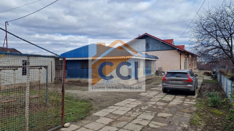 Se oferă spre vânzare / închiriere clădire cu spațiu comercial - Poză 22