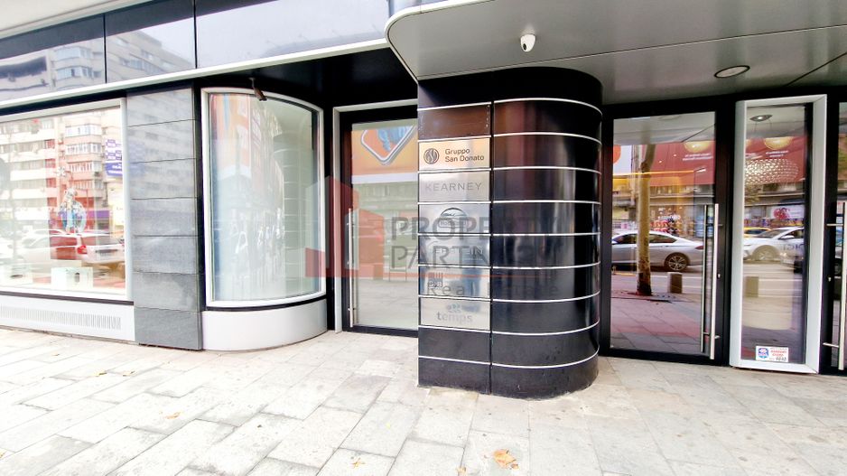 Spatiu retail stradal - Parter cladire de birouri - Magheru - Poză 1