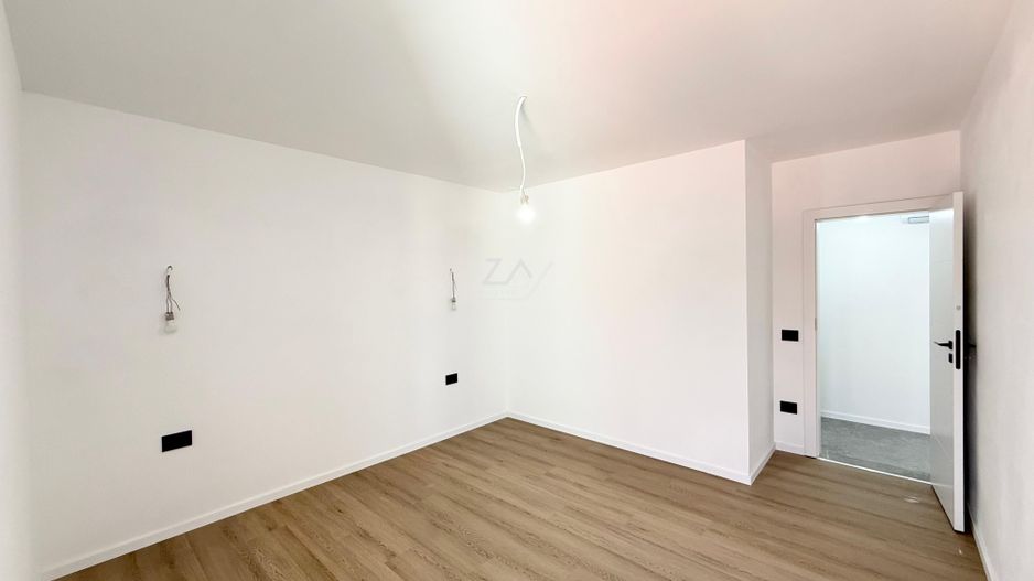 Ap pe 2 niveluri. Bucatarie inchisa, 2 bai. 2 locuri de parcare. - Poză 7