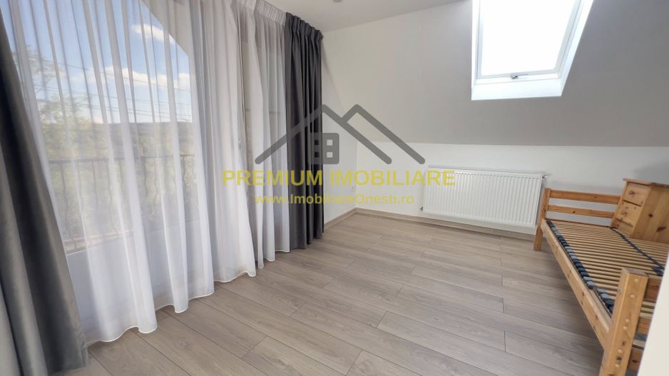 Casa de vanzare la 13 km de Onesti - Poză 16