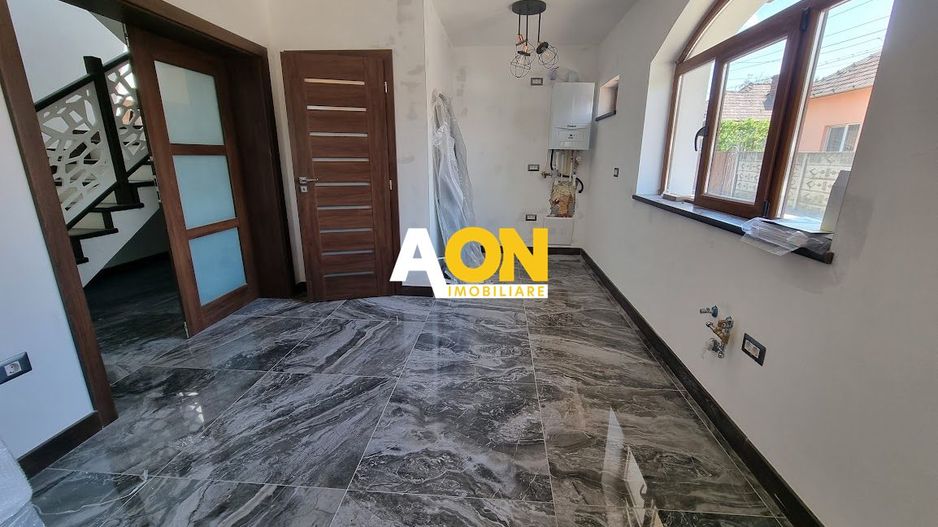 Casă modernă cu 3 dormitoare, terasă și teren generos - Poză 6