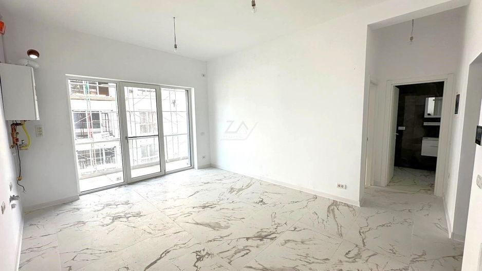 Bloc la asfalt. Loc de parcare. - Poză 1