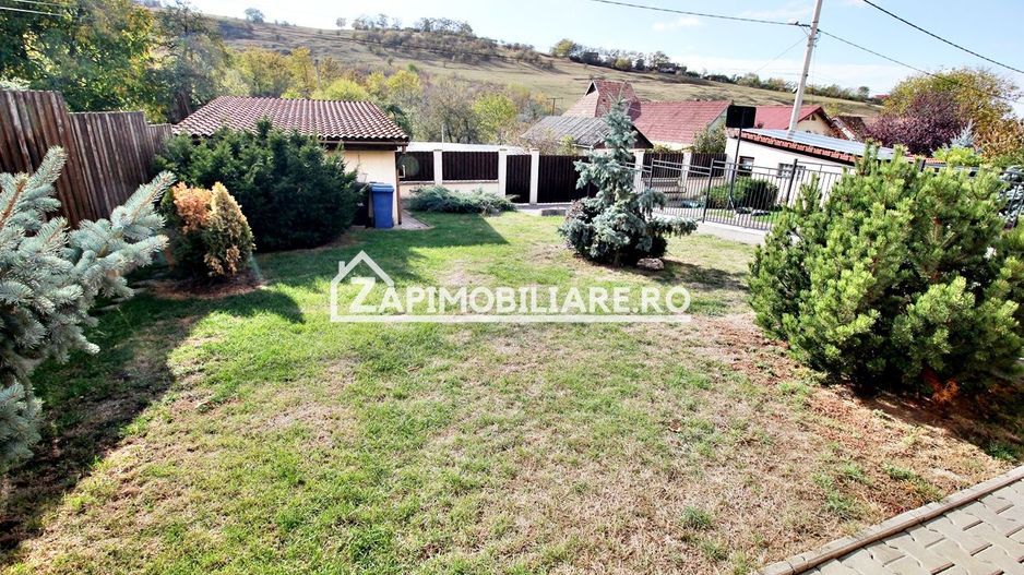 Casa 3 camere, 2 bai,1 garaj,teren 360 mp.zona Dambu Pietros - Poză 2